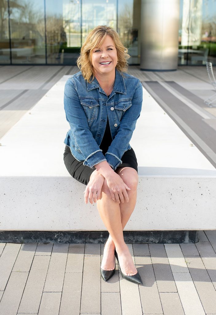 Michelle seated on bench